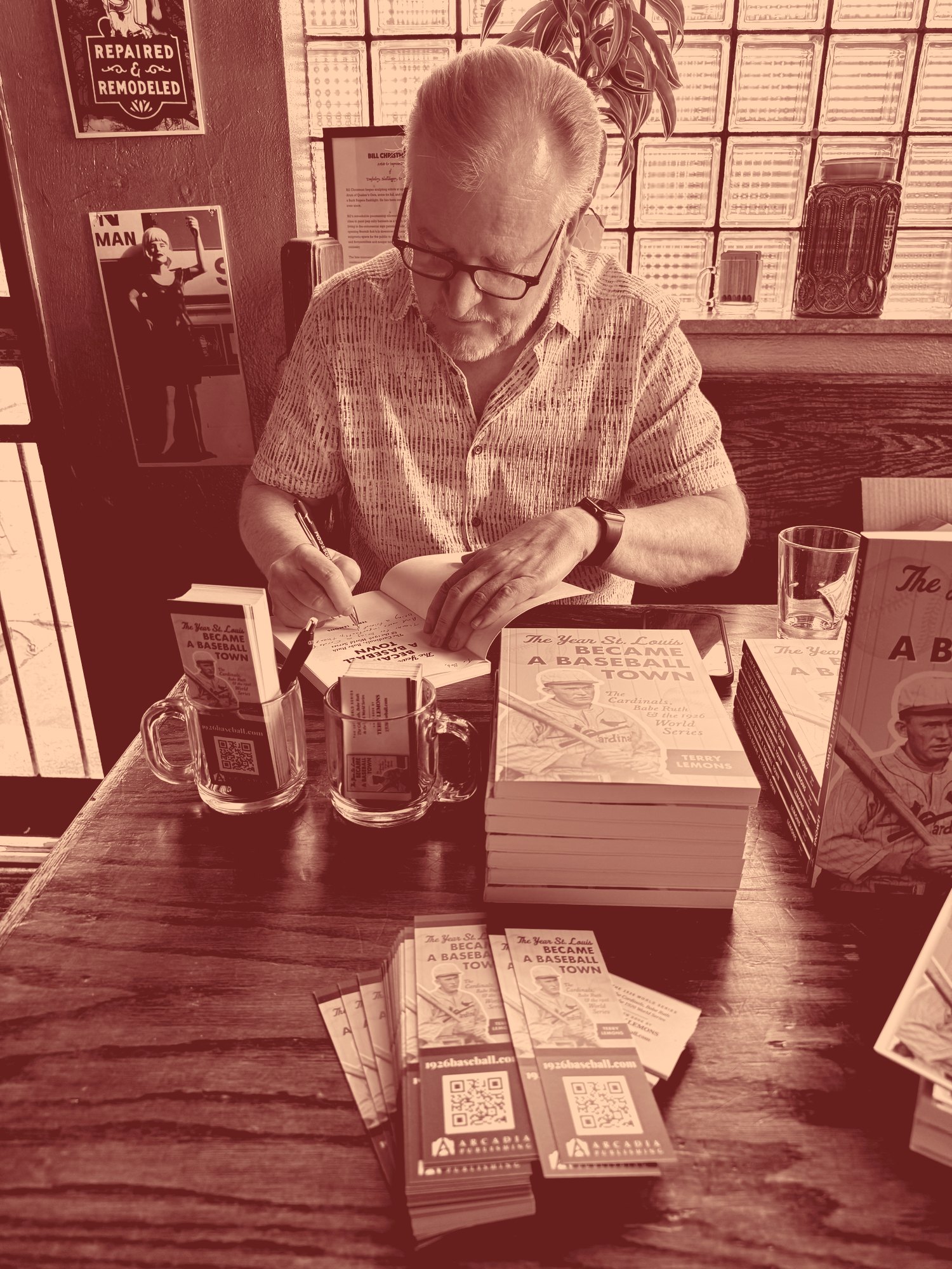 Terry Lemons signing copies of The Year St. Louis Became a Baseball Town at a launch event